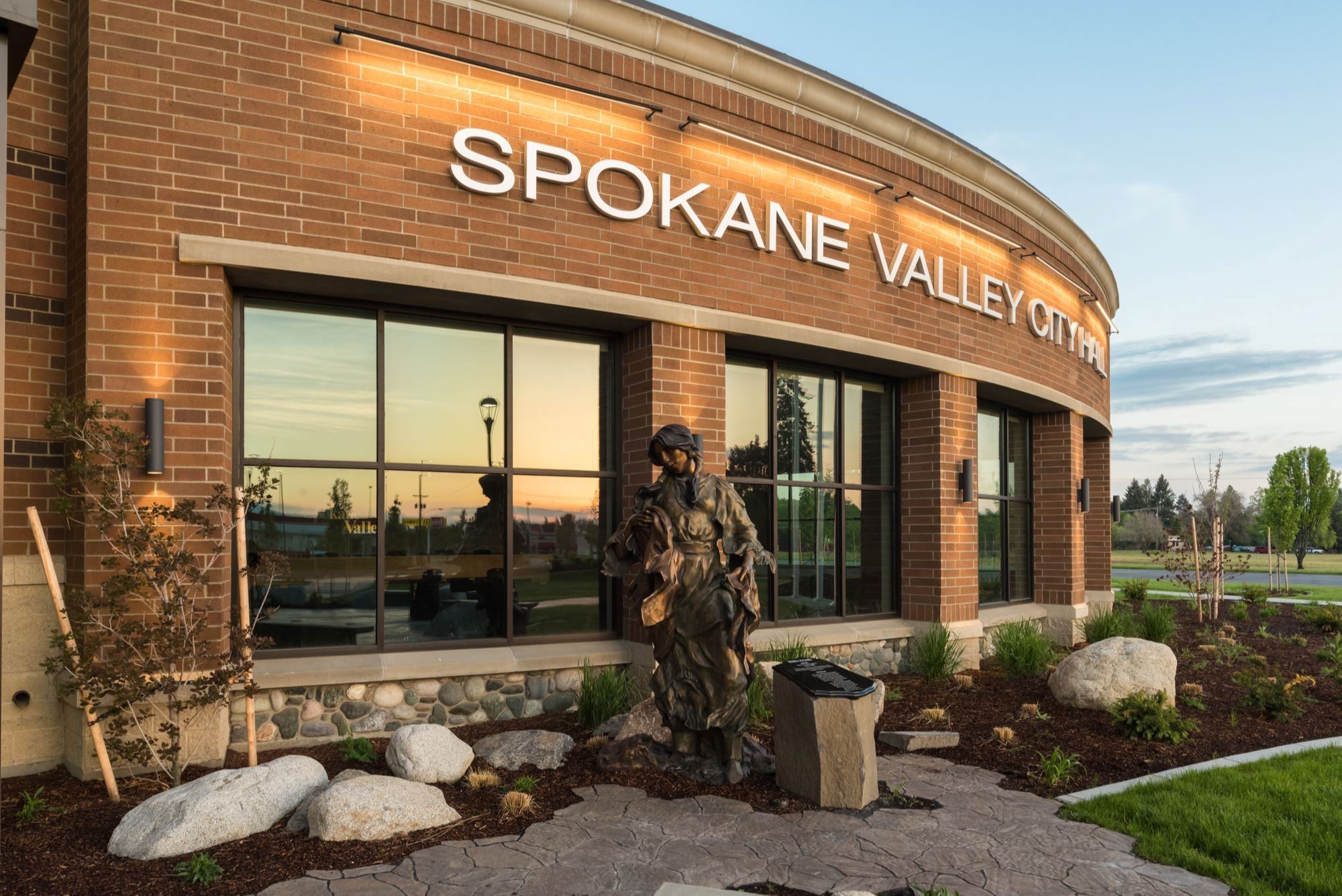 Front door and nearby sculpture at City Hall.